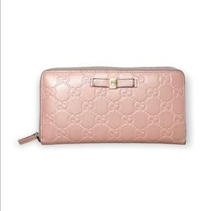 Gucci Tan Guccissima Bow Zip Around Leather Wallet, box included